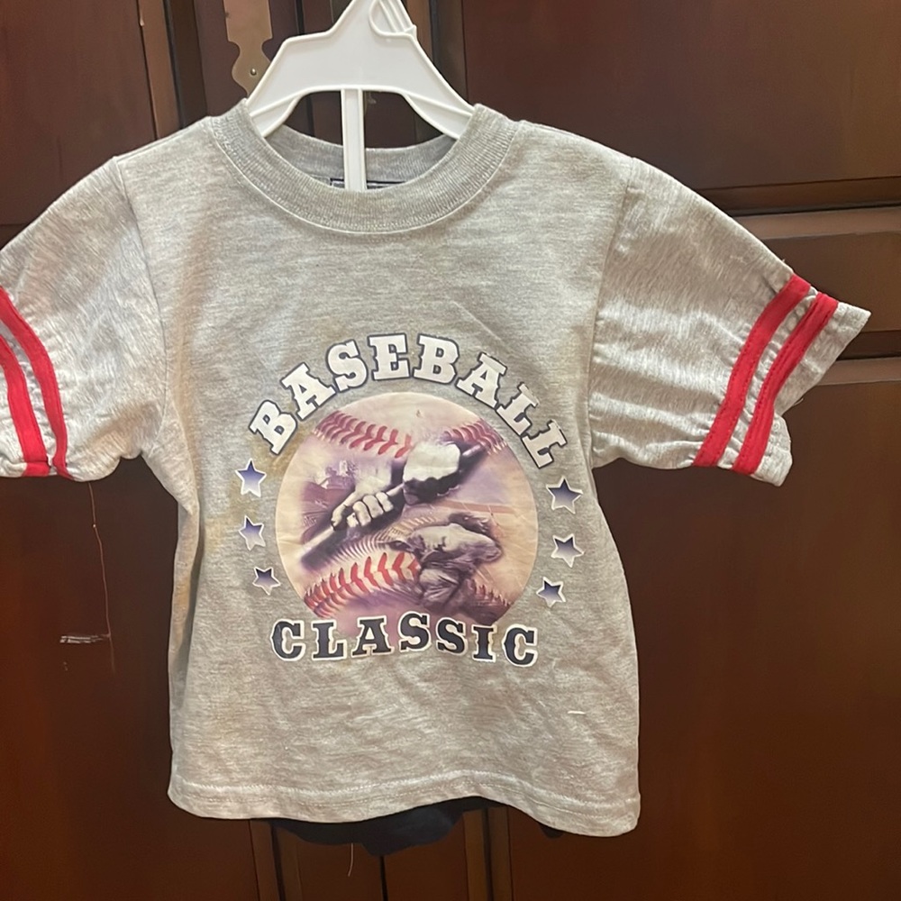 Adorable boys sports set by Urban Extreme. Grey top and blue bottom. Size 2T $20